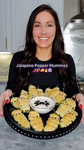 945K views · 15K reactions | Jalapeno Popper Mummies️肋燎 Follow Chef Genevieve LaMonaca for 50 Halloween inspired recipes!  Spice up your Halloween with these jalapeño popper mummies! Perfectly spooky and delicious.  Who’s brave enough to take a bite? #halloweenfood #HalloweenFoodIdeas #halloweeninspo #JalapeñoPopperMummies #SpookyTreats | Chef Genevieve LaMonaca | Facebook