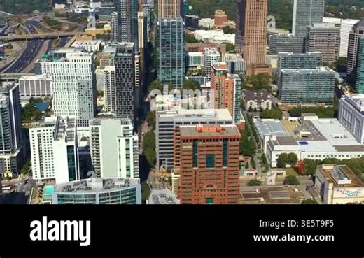 Atlanta, Georgia skyline with prominent skyscraper buildings and roads stretching across the city. Modern urban infrastructure Stock Video Footage - Alamy
