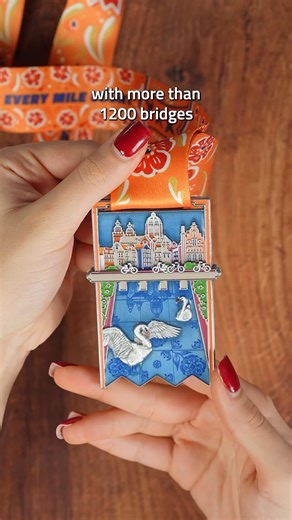 FINALLY… The wait is over — the first of the Artisan Cities is here. THE AMSTERDAM CHALLENGE 📍81 mi / 130 km Where shimmering canals meet world-class museums, cozy cafés, and thousands of bikes weaving through one of Europe’s most free-spirited cities. 🏅 Earn a medal that captures Amsterdam in motion: 🏠 Brick houses tilting over the water 🚲 Bikes rolling across a bridge 🦢 A swan gliding through the canals Pull the tab and watch tulips bloom in the windows. 🌷` So how do you earn the medal? 