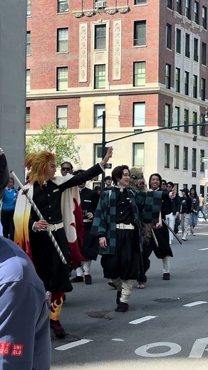 Japanese Parade Featuring Demon Slayer Cosplay and Live Action Performances