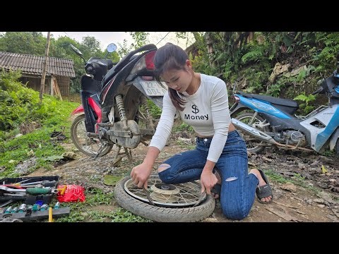 The clever, quick-witted girl helped the man repair his motorbike by replacing the parts.