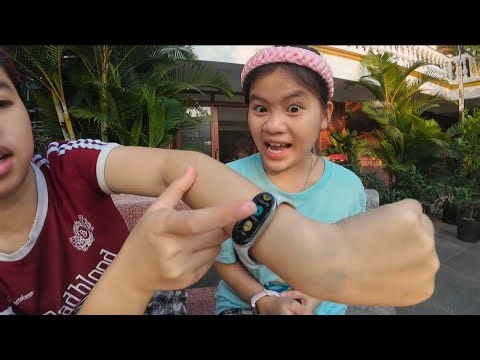 The two sisters were thrilled to receive a smart watch as a gift from their dad for diligently do...