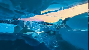 Fast Fly over the glacier. Fantasy northern landscape. Northern lights on the night sky. Aurora Borealis.