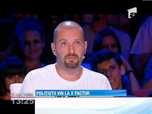 Politistii iau cu asalt scena X Factor!