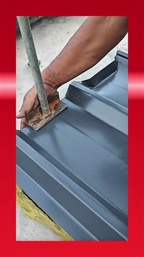 Crimping insulated metal roofing panel edges with a custom metal bending tool#construction #tools