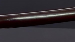 Important Cultural Property Tachi Koshirae (Go: Shishi-O) Black Lacquered Tachi Koshirae for Shishi-O Tachi Kamakura period, 13th~14th C. This sword, named Shishi-O, is said to have been bestowed by the Emperor to Minamoto no Yorimasa (1104-1180), a military commander of the Settsu Genji, as a reward for defeating the supernatural being, Nue. The accompanying black lacquered tachi koshirae is typical of sword mountings often used by samurai in the Japan’s Middle Ages (1192-1573). The hilt, scabb