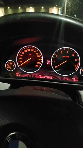 Interior View of BMW F10 Dashboard at Night