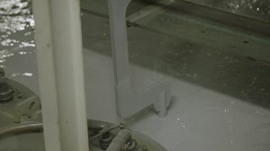 clip-1018937452-slow-motion-painting-department-inside-car-factory