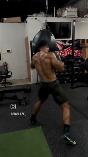 Bodybuilder doing boxing