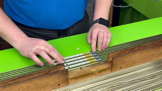 Take a step inside our Mould Shop at PECO, Here is where all the injection moulding happens. In this video you can see how each section of rail is placed into the tooling ready to be injected with the plastic track. Each piece is inspected as they come out of the injection moulder before being packed. | PECO Model Railways