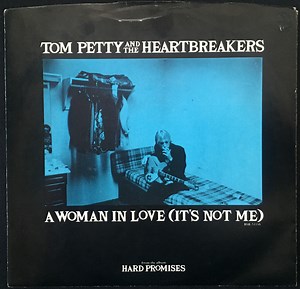 Tom Petty And The Heartbreakers - A Woman In Love (It's Not Me)