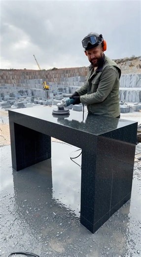 The block turns into a monolithic loft-style office desk—brutalist, heavy, minimal, and premium.