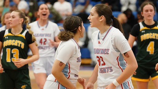 Why are Shawnee Heights basketball players wearing Bob Wells tattoos?