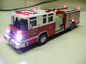 1:64 scale Code 3 Pierce Quantum diecast fire truck model with working lights