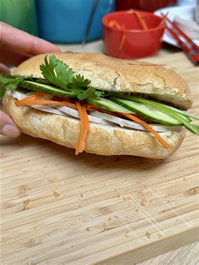 Banh Mi Cha Lua, Vietnamese style sandwich with Vietnamese pork roll. Vietnamese style mayonnaise - one egg yolk - A pinch of salt - A pinch of sugar - A pinch of pepper - 100ml oil - A few drops of lemon juice Pickled carrots and daikon - Carrots - Daikon - Salt - Equal amount of sugar and vinegar Pickle the carrots and daikon at least an hour. Assembling banh mi 1. Pistoles* 2. Mayonnaise 3. Pate, I use pork pate 4. Vietnamese pork roll 5. Pickled carrot and daikon 6. Soy sauce/optional 7. Sli