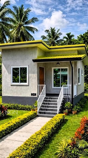 Nathaniel Guevarra Navarro on Instagram: "🇵🇭Caption: A charming 1-bedroom, 1-comfort-room small home designed with simplicity and elegance. The exterior features smooth concrete walls in soft gray, highlighted by a modern flat roof with fresh green accents, surrounded by lush tropical landscaping. Inside, clean concrete-finish walls, glossy earth-tone floor tiles, and large windows create a bright, airy feel. Black wood furniture, glass elements, and soft blue curtains add contrast and warmth,