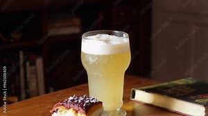 Tea cup falling to the ground and breaking into pieces in super slow motion captured with high speed camera. Slow-motion of ice cube falling in glass of water