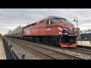 Metra #405 (Milwaukee Road Heritage Unit) pushes an inbound with new bicycle car