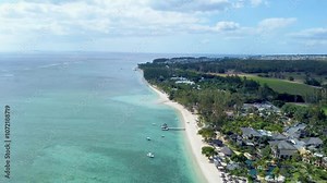 Aerial view in Mauritius over Flic en Flac area and it's beach, a beautiful tropical place in the Indian Ocean