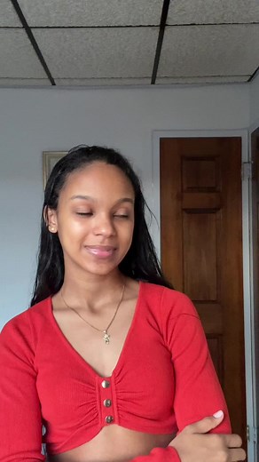 Stylish Cropped Top Look with Expressive Hand Gestures