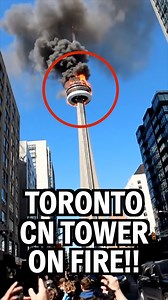 Imagine walking through downtown Toronto on a bright afternoon. You’re weaving through the usual traffic, the chatter of people, the horns, the everyday rhythm of the city — when suddenly, everything stops. Heads tilt skyward. Conversations fall quiet. And there it is: the CN Tower, its observation deck glowing red against the pale blue sky, smoke spilling outward and drifting across Lake Ontario. Some people stand frozen, whispering “Oh my god…” under their breath. Others reach for their phones