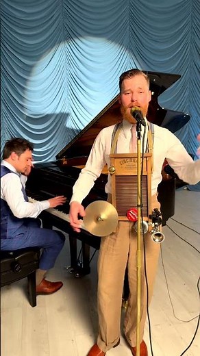 Playing the 1920s song, "Margie" on washboard