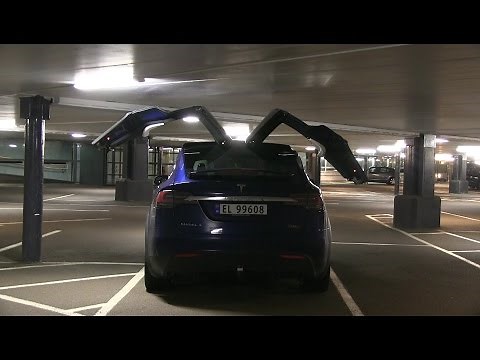 Opening falcon wing doors in garage