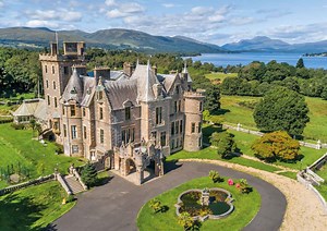 A fantasy castle for sale on Loch Lomond, with a Rennie Mackintosh library and a herd of Highland Cattle