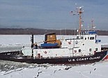 Coastguard ice cutters break a path in frozen Hudson river
