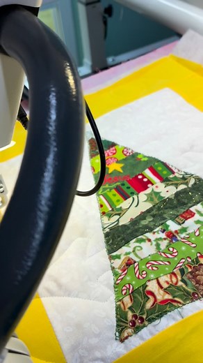 Started this colorful Christmas quilt with magic thread. | The Final Stitch