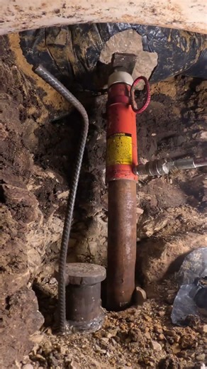 Driving Steel Piers to Load-Bearing Strata | Foundation Stabilization Timelapse