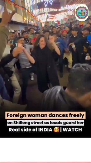 A video showing a foreign woman dancing freely on a busy street in Shillong has gone viral on social