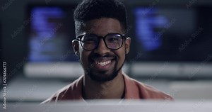 Business man, computer at night and information technology, programming or cybersecurity software in office. Face of African expert or programmer with coding, glasses for vision and data research