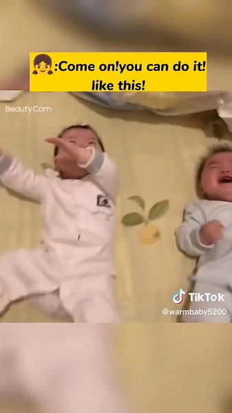 Younger sister teach her brother how turn over lol #twins #cutebaby #babiesoftiktok #funnyvideos