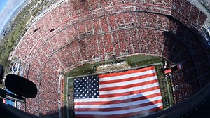 HH-60 Pave Hawk helicopters from the 129th Rescue Wing, Moffett Air National Guard Base, Mountain View, California, perform a flyover at the Levi's Stadium, Santa Clara, California, during the pregame activities of the San Francisco 49ers vs Atlanta Falcons football game, December 15, 2019. The HH-60 pilots and crew members were later brought to the field and introduced to the fans while the aerial footage of the flyover was being shown on the big screen. (U.S. Air National Guard video by Techni