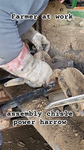 Farmer at work - assembly chisle power harrow - 4