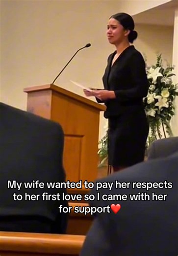 I came today because I wanted to do the grown thing. He was my first love, my high school sweetheart, and even though my life is completely different now, it still felt wrong to not show up. My husband didn’t hesitate when I asked him to come with me. He sat right there in the front with me, on the aisle, just holding it down so I wouldn’t have to walk through all that by myself. I told myself it was just paying respects, just saying goodbye properly, just closing a chapter that ended a long tim