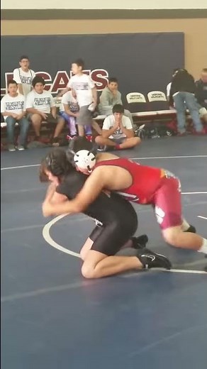 Girl wrestler pins boy