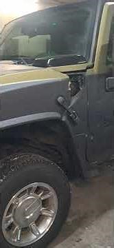 2006 H2 Hummer Sut got into a wreck taking Lambo doors off and putting stock hinges on