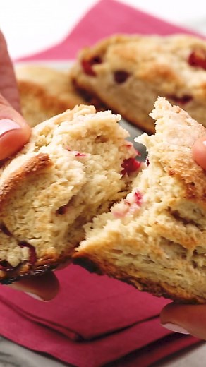 Cranberry scones might not be traditional, but subbing the tart, jewel-like berries for the usual currants or raisins is an inspired touch, giving the English scone a delicious American slant. Get the recipe: bit.ly/4ffj2wV | Martha Stewart