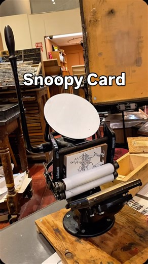 Sacramento History Museum on Instagram: "Sometimes we find printing items online and want to see who they’d turn out in our print shop at the Sacramento History Museum. This large linocut was acquired last year and Jared wanted to see how letterpress printing it would turn out, especially for some personal holiday cards. The print is of Snoopy, Woodstock, and a Christmas tree. This was printed using a 4x6 Golding Official No. 2 tabletop printing press using opaque white oil base ink. #SacHistory