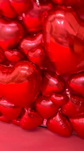 Wait until the end of the video! What do you think? Did I understand the assignment? All it takes is 150 heart shaped balloons, a roll of red paper, 3 hours of work, to make photos that will last my wife and her friends a lifetime. #galentines #photobackdrop #diy | DadSocial