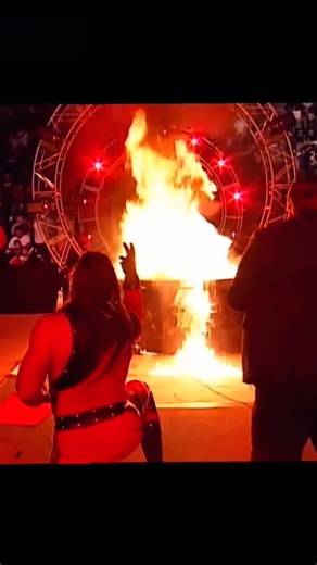 Kane burns Undertaker inside the casket 😳 #wwe #kane #undertaker