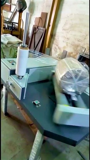 Roll Wrapping Machine | Stretch Film Protection for Paper, Foil & Reels | Sharp Engineering