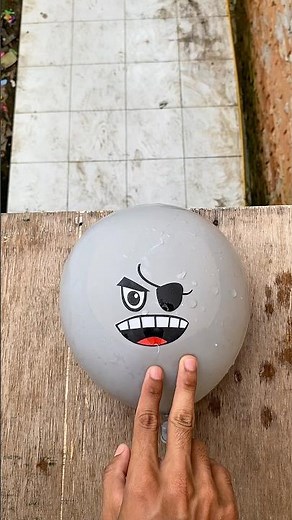 Experiment: Will the emoji water balloon explode if dropped from a height?