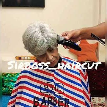 headshave old woman in barbershop by barber