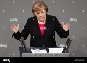 German Chancellor Angela Merkel issues a government policy statement at the Bundestag in Berlin, Germany, Thursday, 14 December 2006. During her speech Merkel urged the states of the European Union to work closer together on Thursday as Germany prepared to take over the bloc's presidency. Merkel said Germany intended to use is presidency to press ahead with a timetable for the prop Stock Photo - Alamy