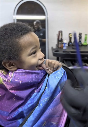 Young Ivan, my man 100 grand 🫶🏽 The first time Ivan came to Me about a year or so ago & HE WAS NOT GOING FOR IT 😂 Moms had to hold him & he cried a little.. Crazy thing about it is, the cape I’m using in this video and the stick that’s holding my phone to the chair I bought just for him because he was one of my first Toddler Clients once I started promoting myself as The Kidz Barber 💈.. About the 3rd or 4th time He came, His Mom went to hold him still and cried and fought his mom to let him 