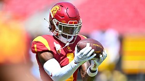 Why does USC have a 12 on their helmet?