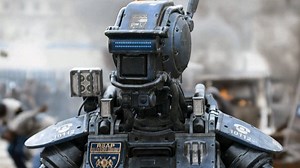Watch the new Chappie trailer and fall in love with a police robot